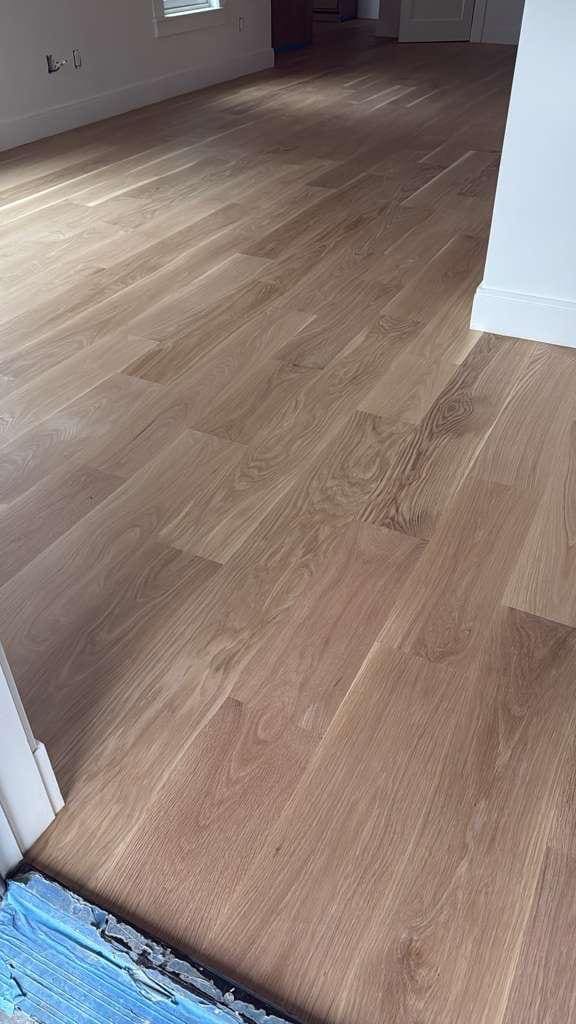 Close view of the white oak grain across laid boards